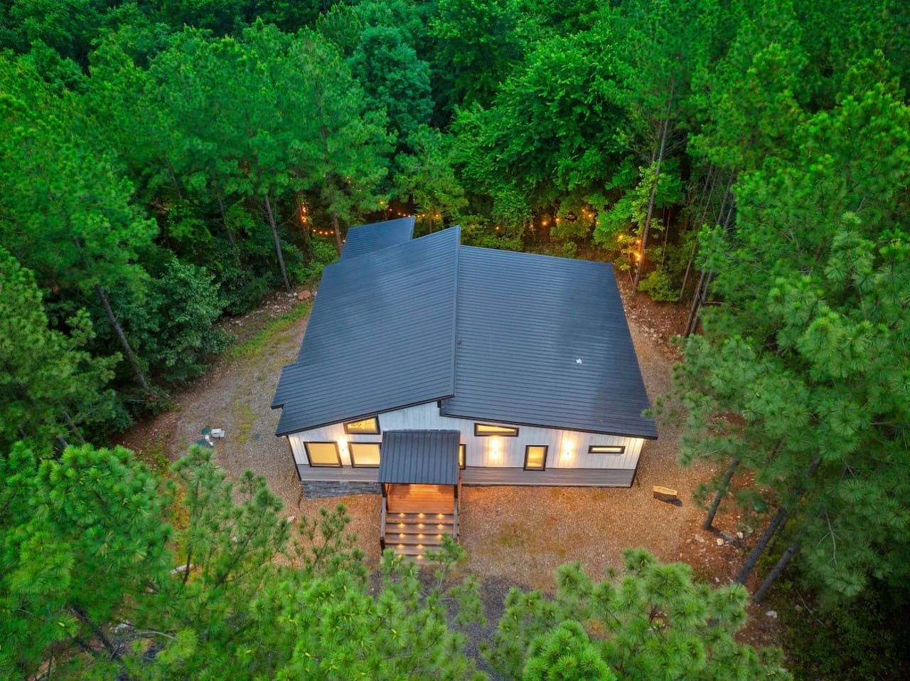 This sleek cabin feels like your own private escape where the woods wrap around you and everything else just melts away.
