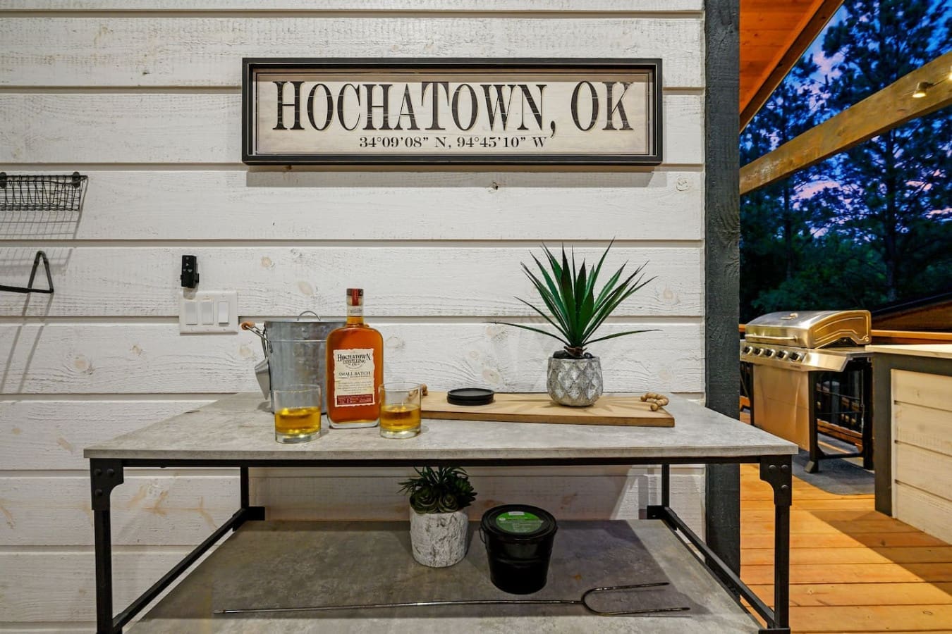 This Hochatown-themed bar corner is basically screaming "let's make some memories" without you having to leave the house.
