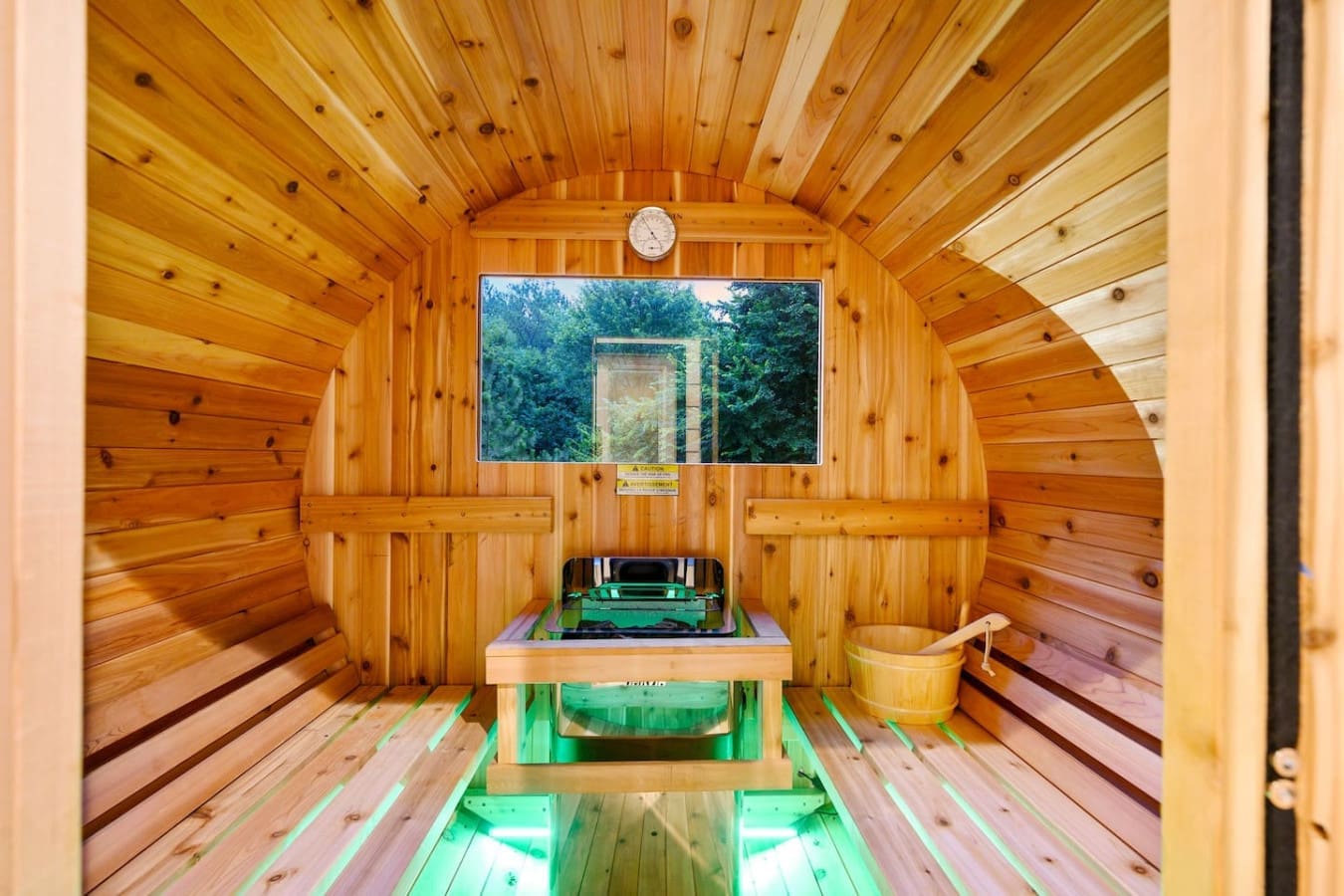 Nothing beats sweating it out in this cozy wooden sauna and then jumping straight into the lake to cool off.