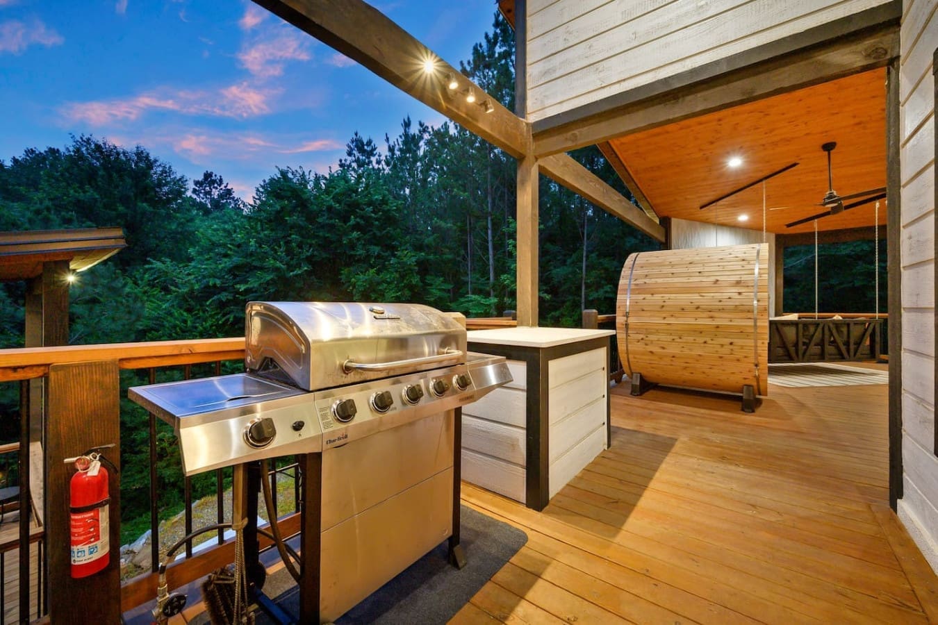 This deck is basically where you'll spend every evening grilling, soaking in the hot tub, and wondering why you ever leave.