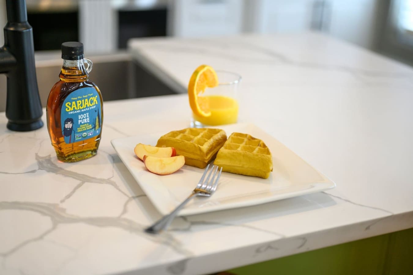 Nothing says "vacation mode activated" like drowning your waffles in syrup and citrus before noon.
