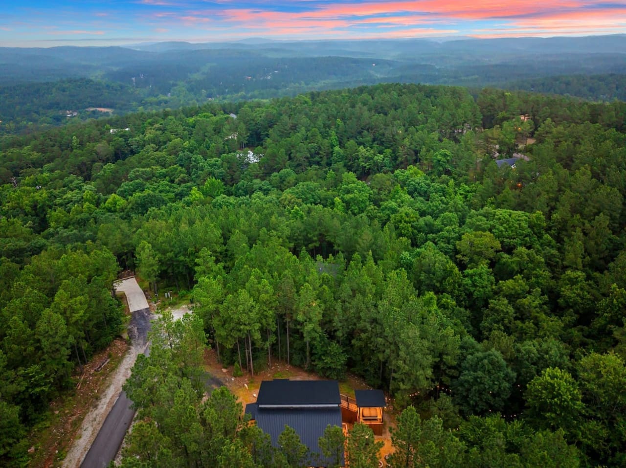 This cozy mountain hideaway is basically your permission slip to disappear into the trees for a few days and actually turn your phone off.