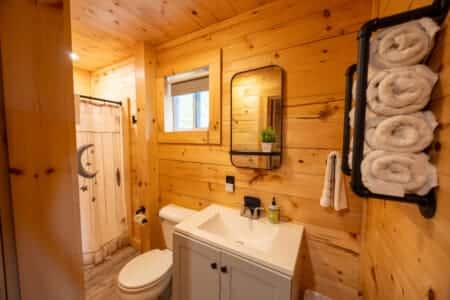 Fresh air, cozy cabin, and a warm shower after lake adventures.