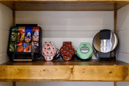 Your favorite kitchen gadgets and waffle makers have their own cozy shelf ready to help you whip up cabin breakfasts.