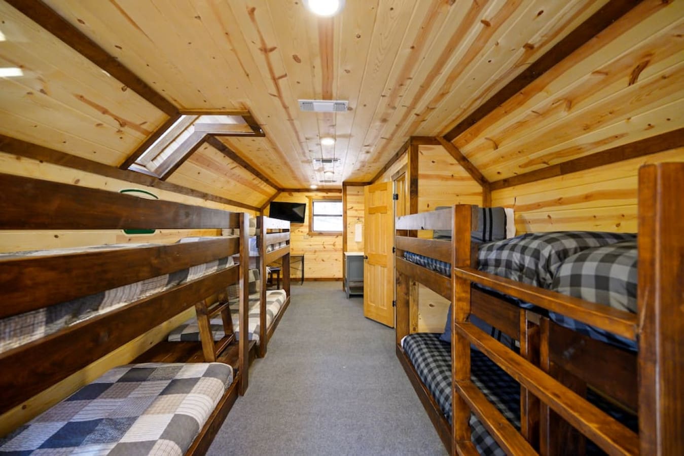 The Eastwood cozy cabin's Bunk Room with 8 Twin Beds perfect for the other members of the family or friends.