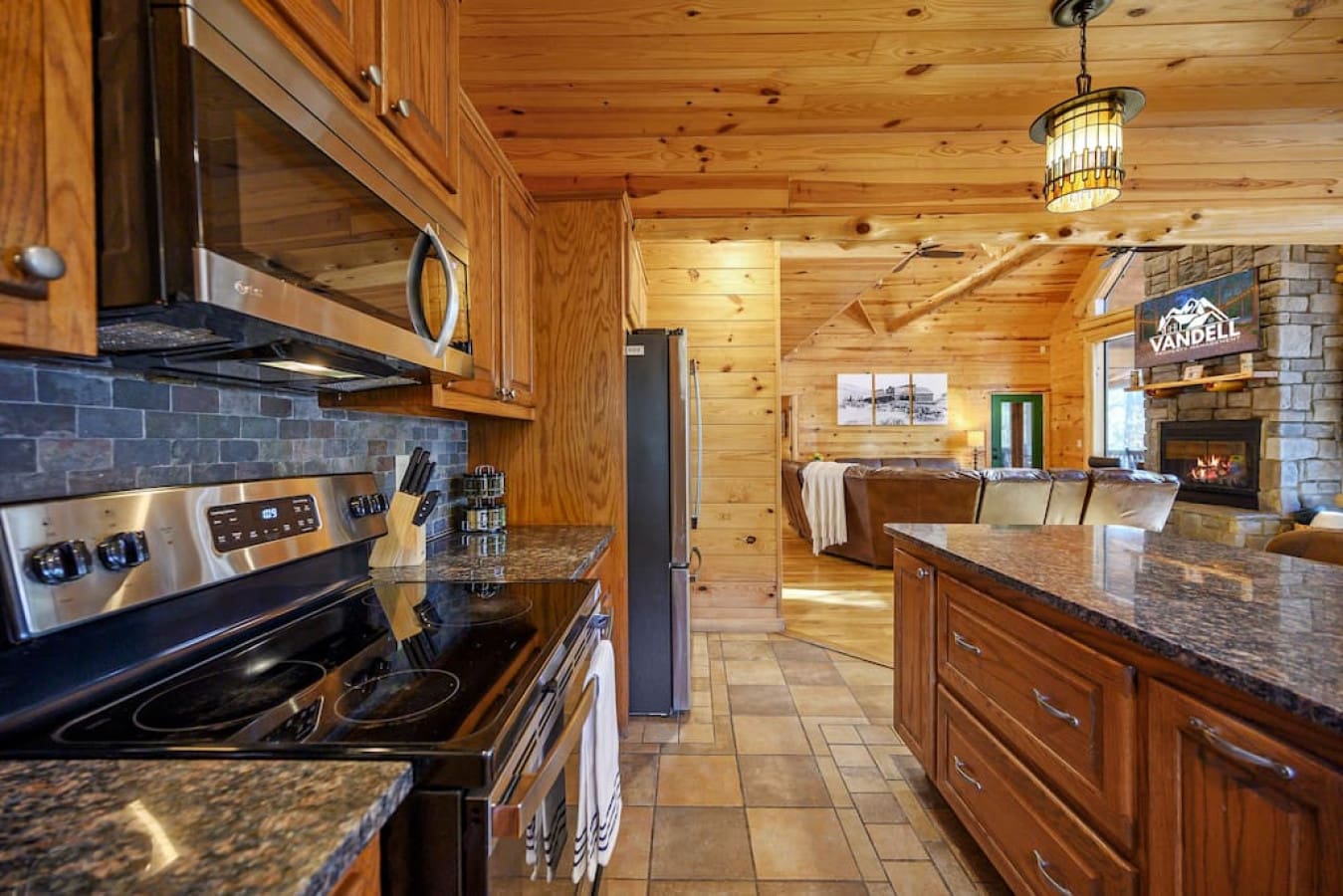 Our kitchen stove is a chef's dream, with all the burners and oven space you need to cook up a feast. The convenient knife block and spice rack keep all your cooking essentials within reach, making it easy to prep and serve your favorite dishes.