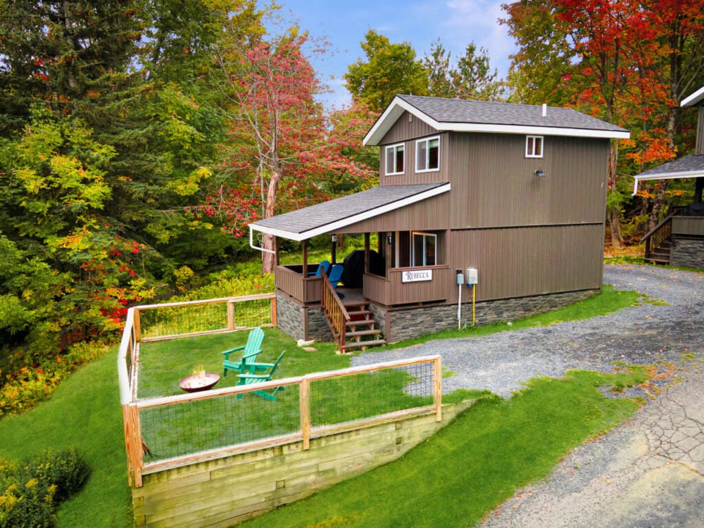 Peaceful evenings, glowing windows, and the quiet beauty of cabin life await.
