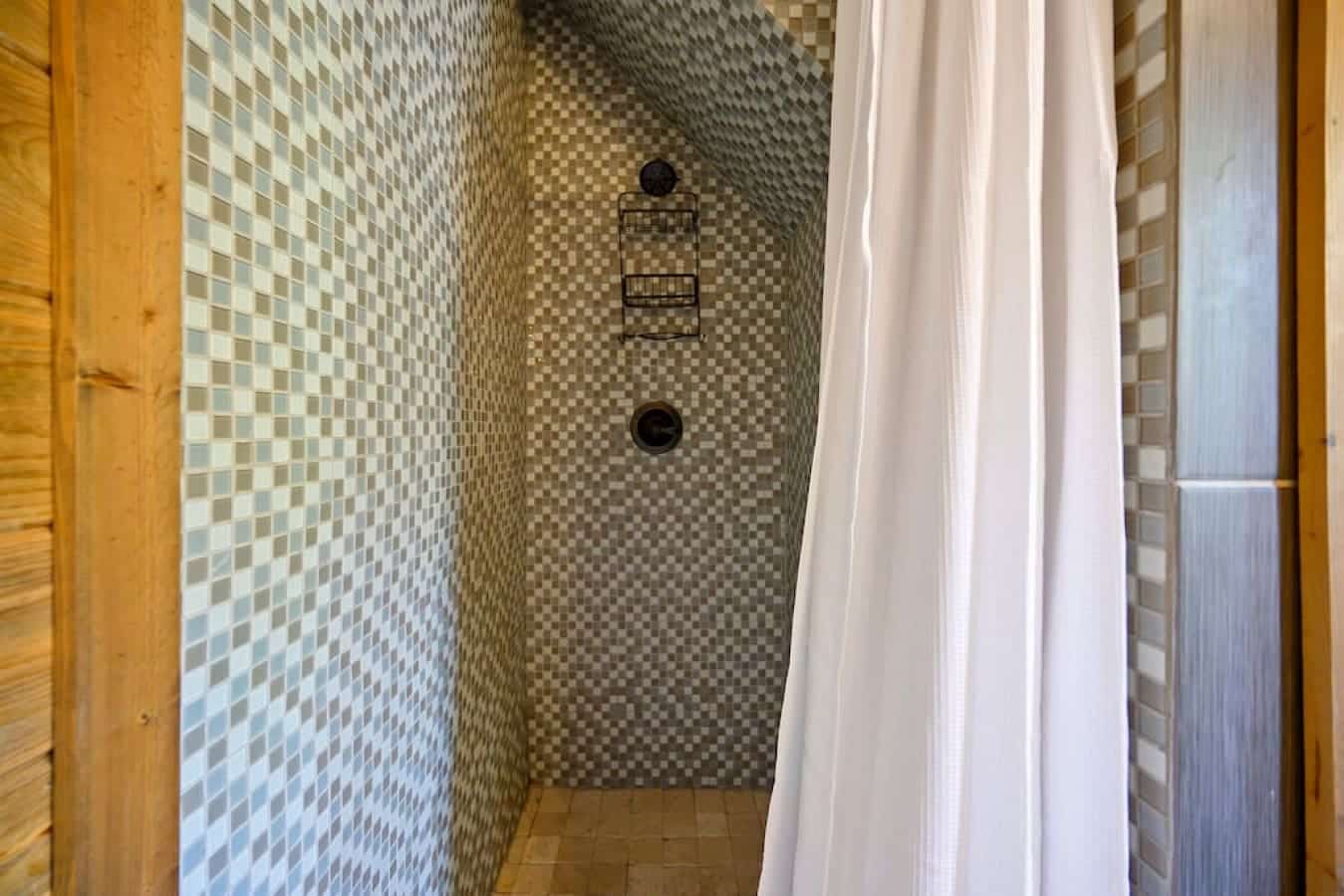 Rustic luxury: immerse yourself in our cabin shower oasis.