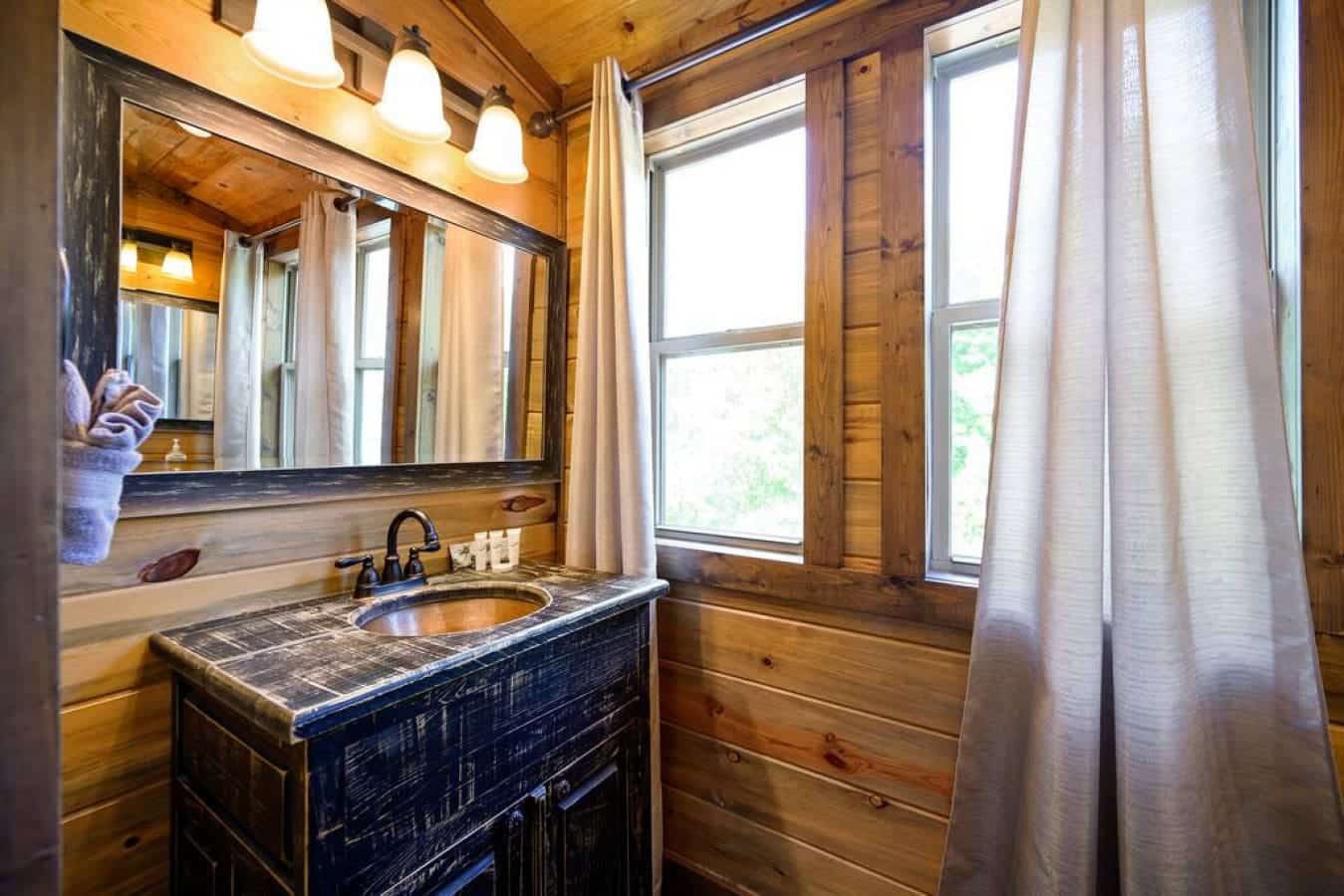 Brightening your space with our stylish sink and expansive mirror.