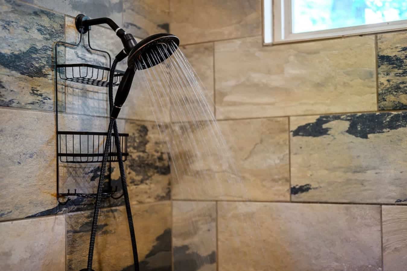 Modern luxury: indulge in the elegance of a black shower head.