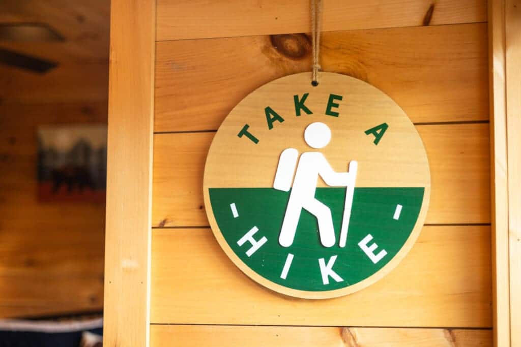 This sign’s got the right idea: adventure awaits just outside the door.