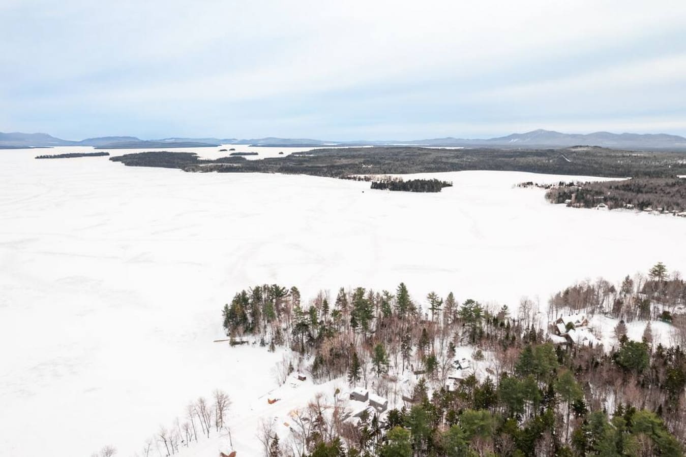 Where every snowflake tells a story of our cabin's winter charm