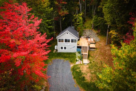 Bird’s-eye view of cabin and grounds.