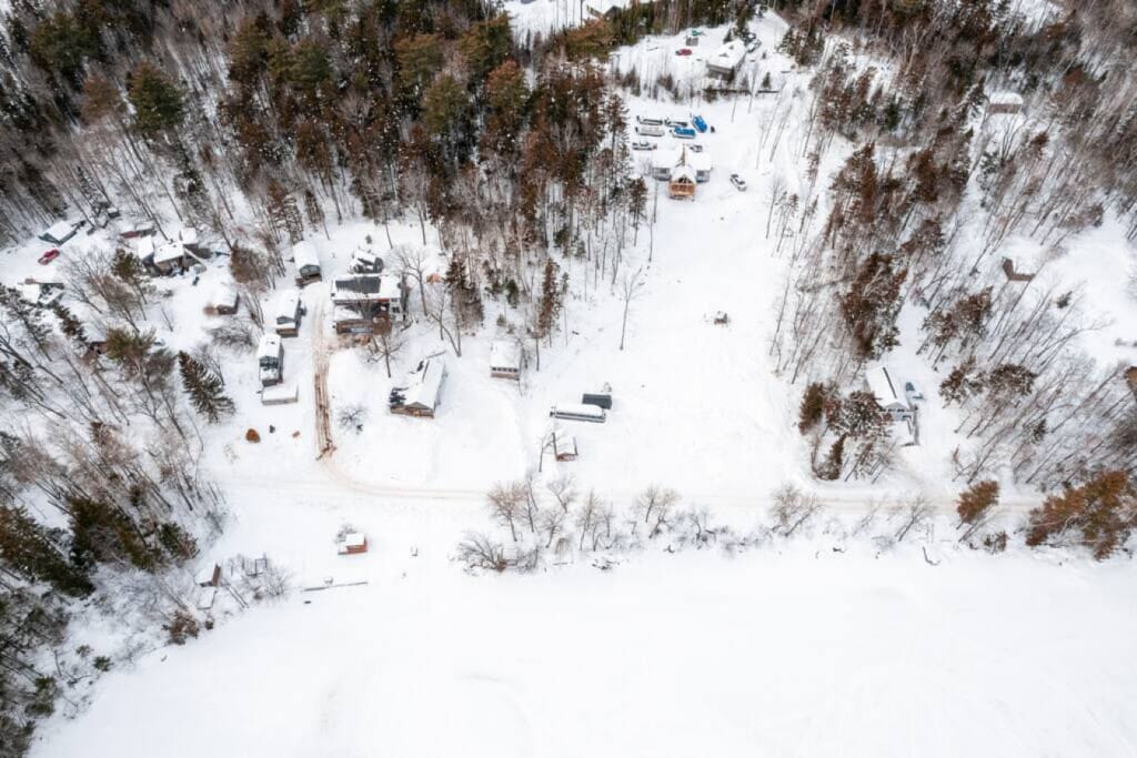 Nothing beats a frozen lake surrounded by towering pines—it's the kind of peaceful, snowy Maine scene that makes you feel a million miles away from everything.