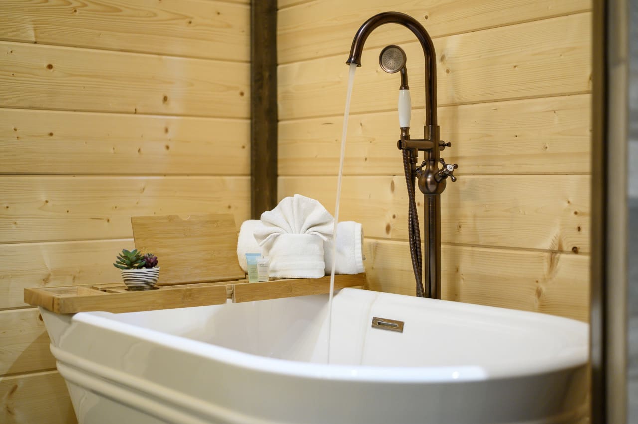 Indulge in a moment of peace in our inviting tub.