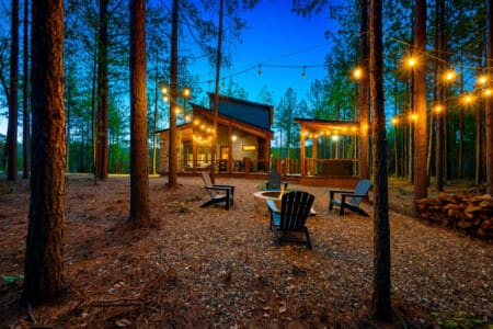 Ambiance aglow: string lights and fire pit magic.