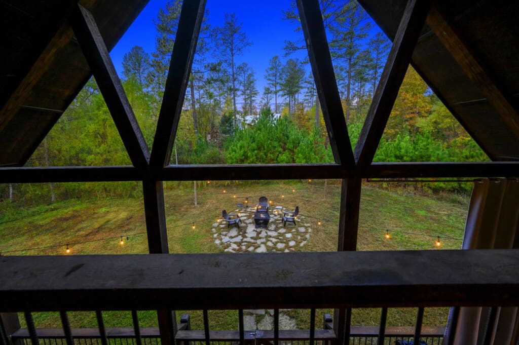 Viewing the dance of flames from cabin refuge.