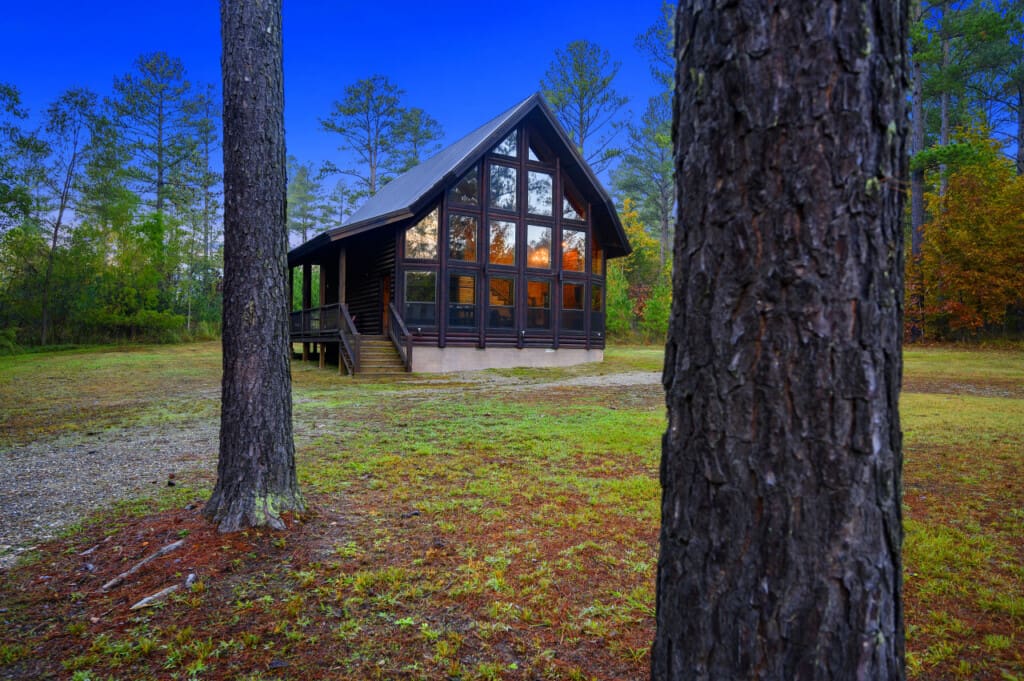 Whispering pines guard this rustic retreat.