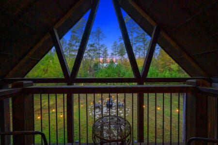 Cozy nights captured through cabin windows.