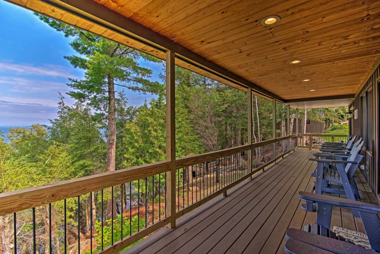 Nature's Retreat: Where Wooden Chairs Offer a Front Row Seat to the Majestic Dance of Towering Trees.