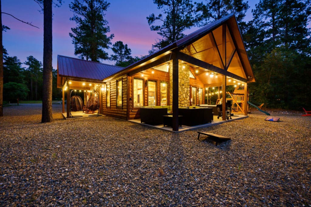 Glowing warmly in the night, our cabin awaits