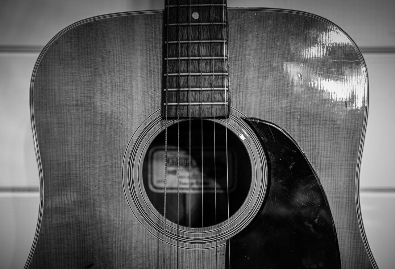Strings that sing melodies of soulful stories. 🎶📖