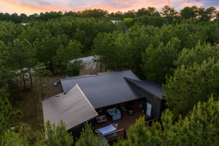 A panoramic view of our rustic retreat from the sky. 🌌🏡