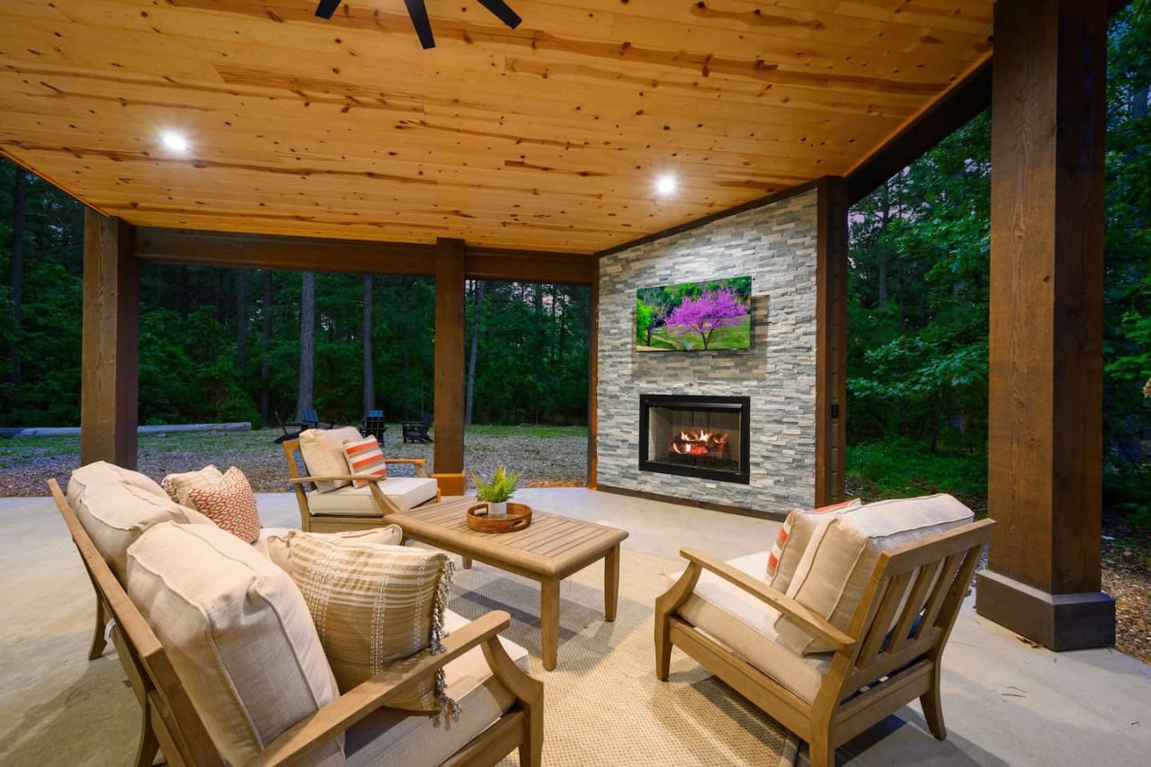 Relax in style—enjoy your favorite shows and a crackling fire in our outdoor retreat.