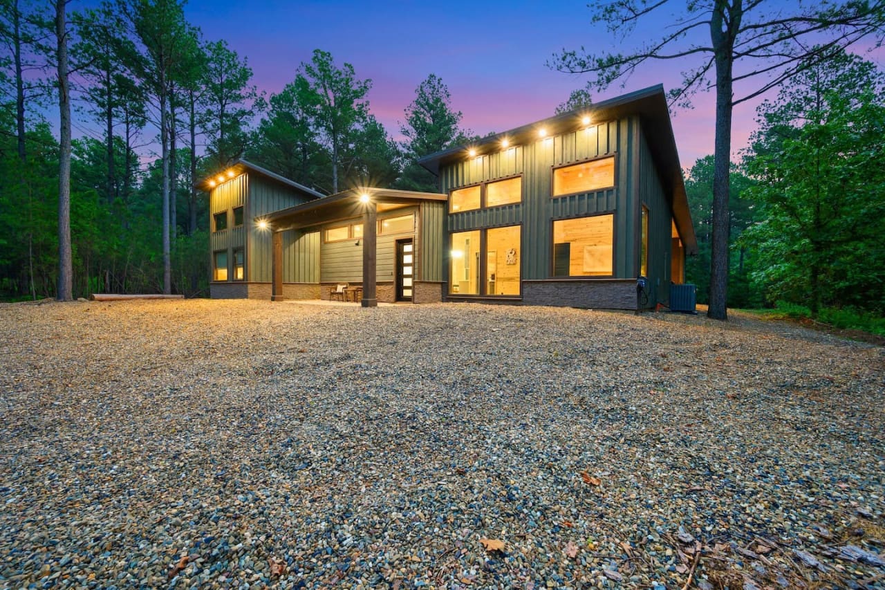 Welcome home to your cabin retreat—where rustic charm meets serene surroundings.