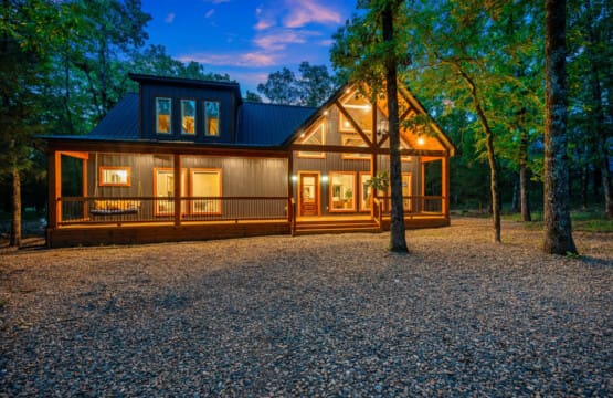 The perfect blend of cozy and picturesque—experience the inviting front view of our cabin.