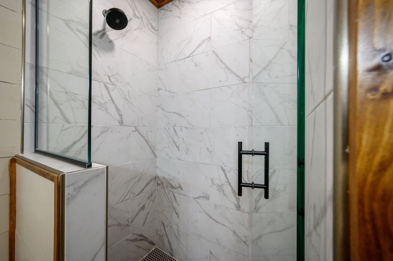 Step into a world of elegance with our glass door shower—where modern design meets luxurious comfort.