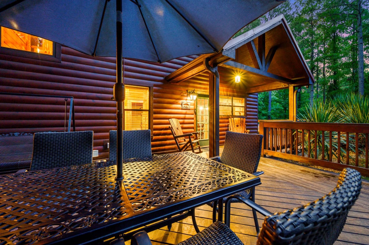 Dine al fresco in style under the shade of our charming outdoor umbrella.