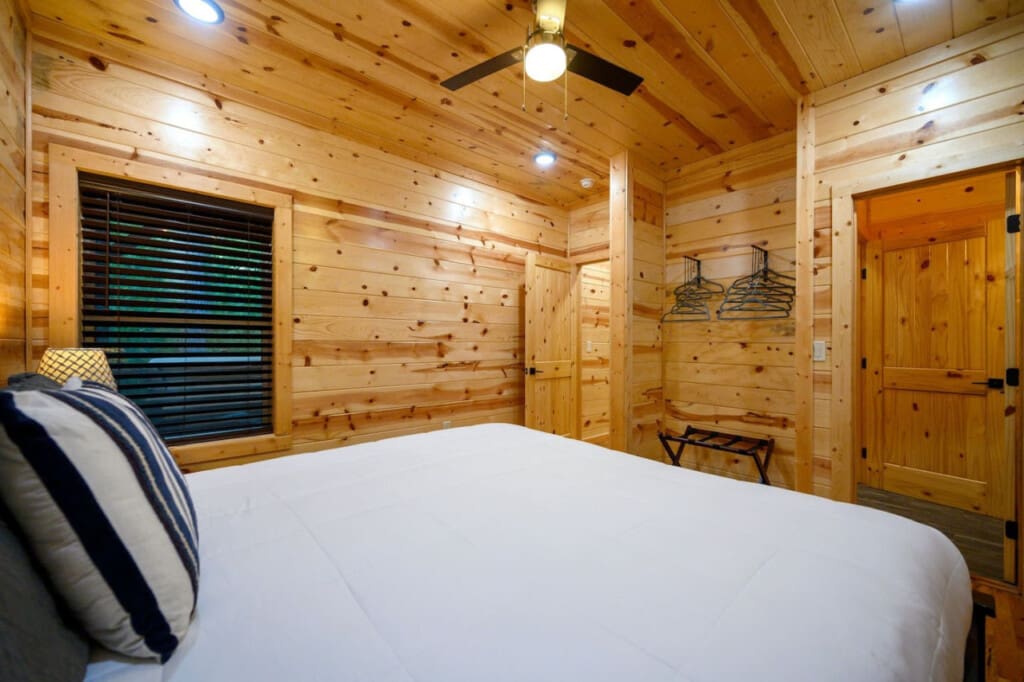 Breeze into comfort with a ceiling fan that keeps your bedroom cool and serene.