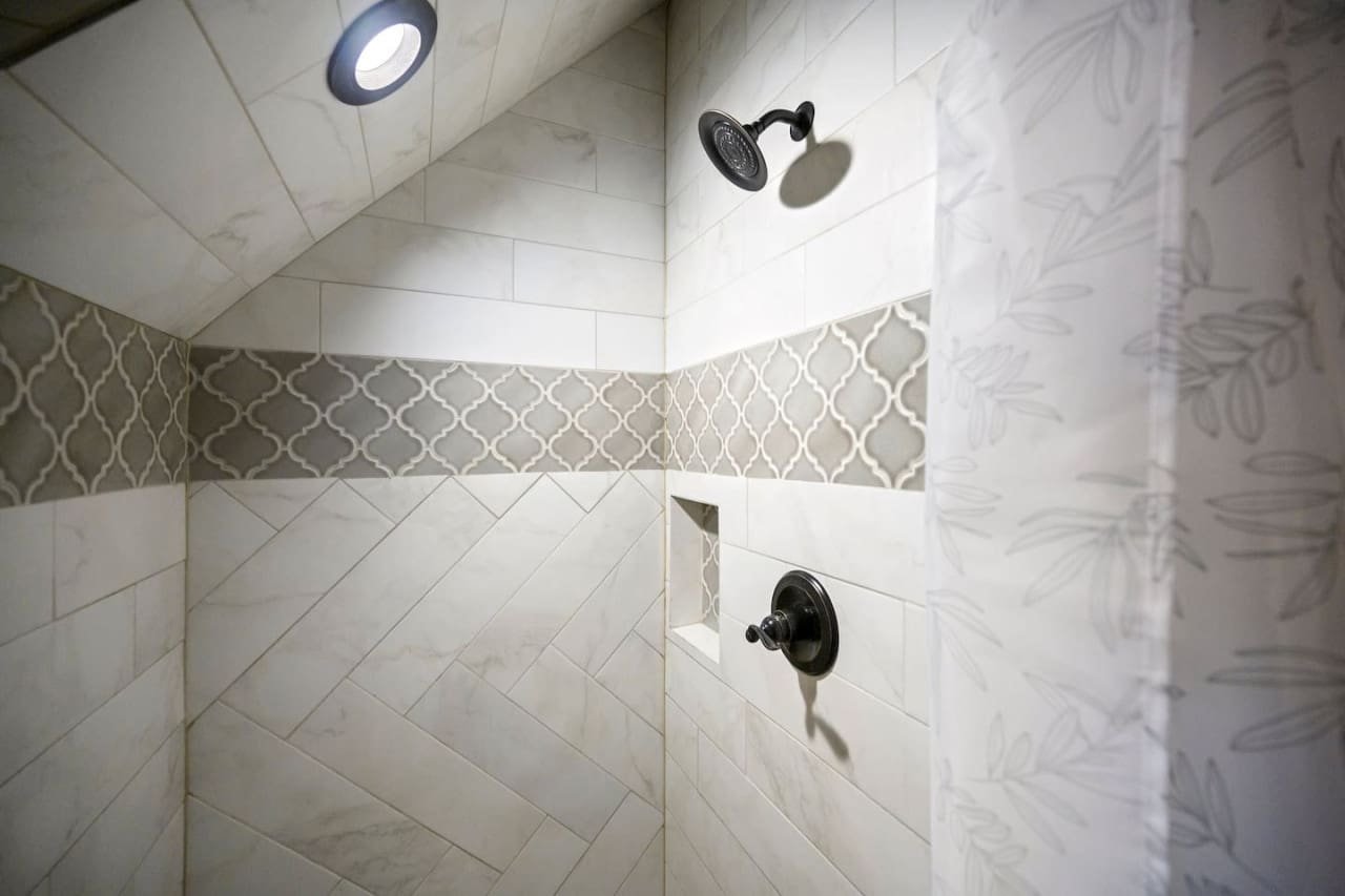 Step into comfort and refreshment with our modern shower, designed to provide a rejuvenating experience every time.