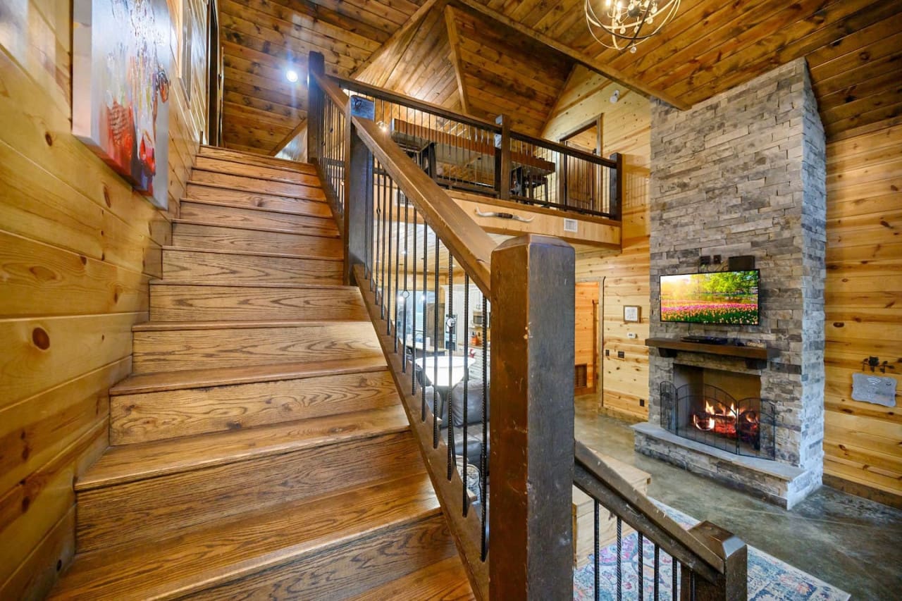Every step tells a story—explore the charm and warmth of our cabin as you climb the stairs.