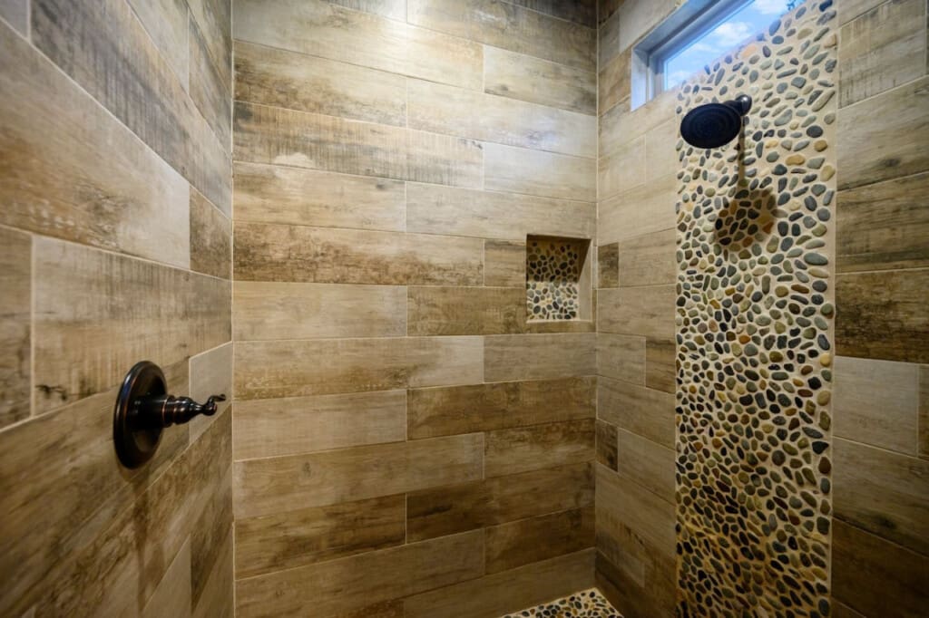 Experience the perfect blend of style and functionality with our chic tiled shower, adding a touch of sophistication to your routine.