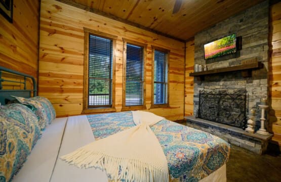 Elevate your bedroom experience with a TV that blends seamlessly into your restful retreat, offering entertainment and comfort.