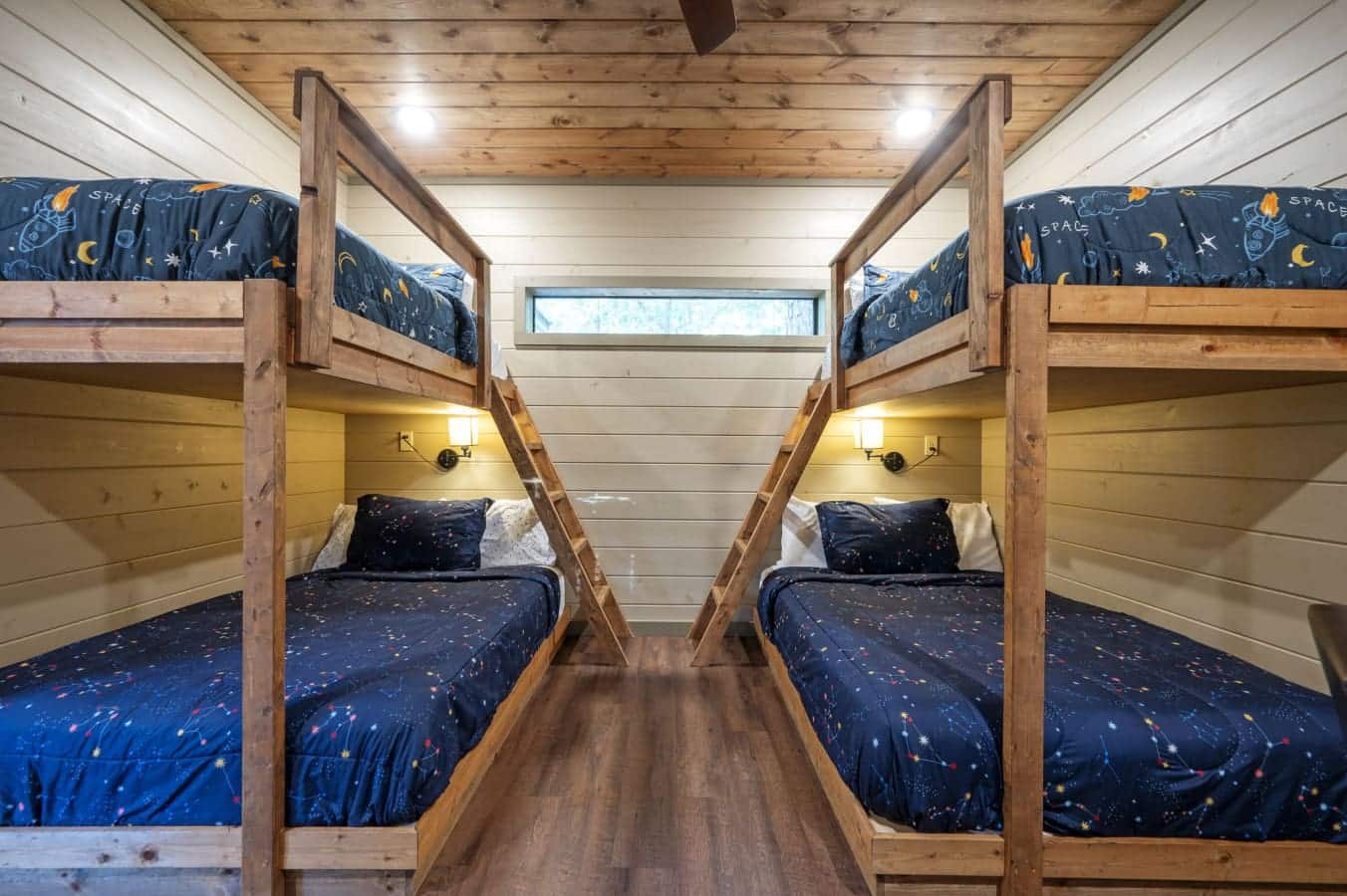 Relax in style in this beautifully designed bedroom with vaulted ceilings.