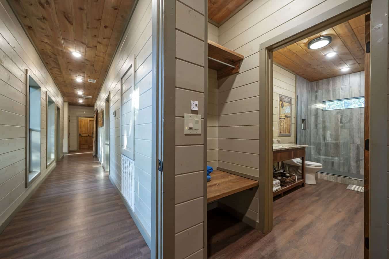 This stylish bathroom features a perfect blend of rustic and modern design.