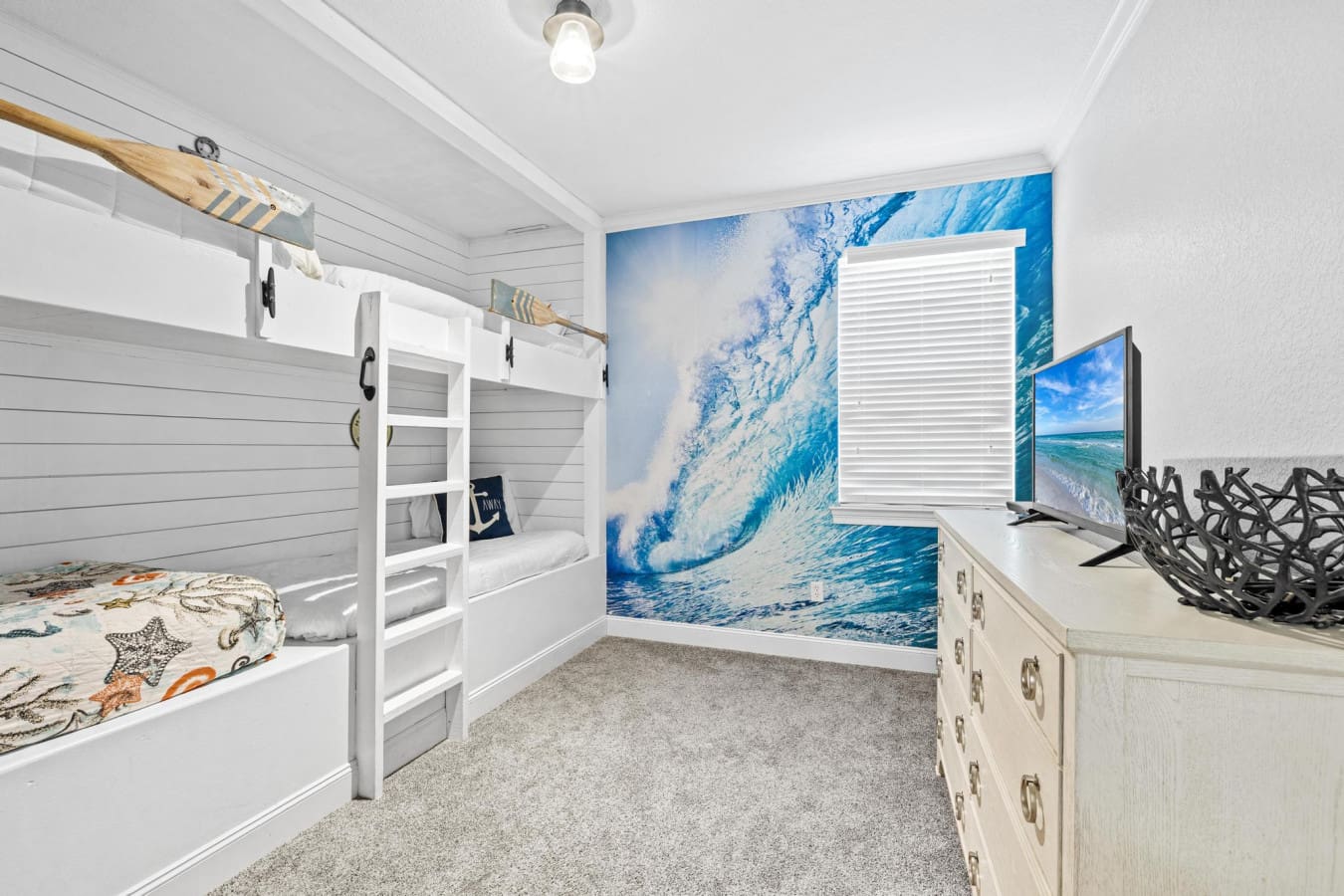 Sleep, stream, repeat—our bunk room brings the comfort and the entertainment.