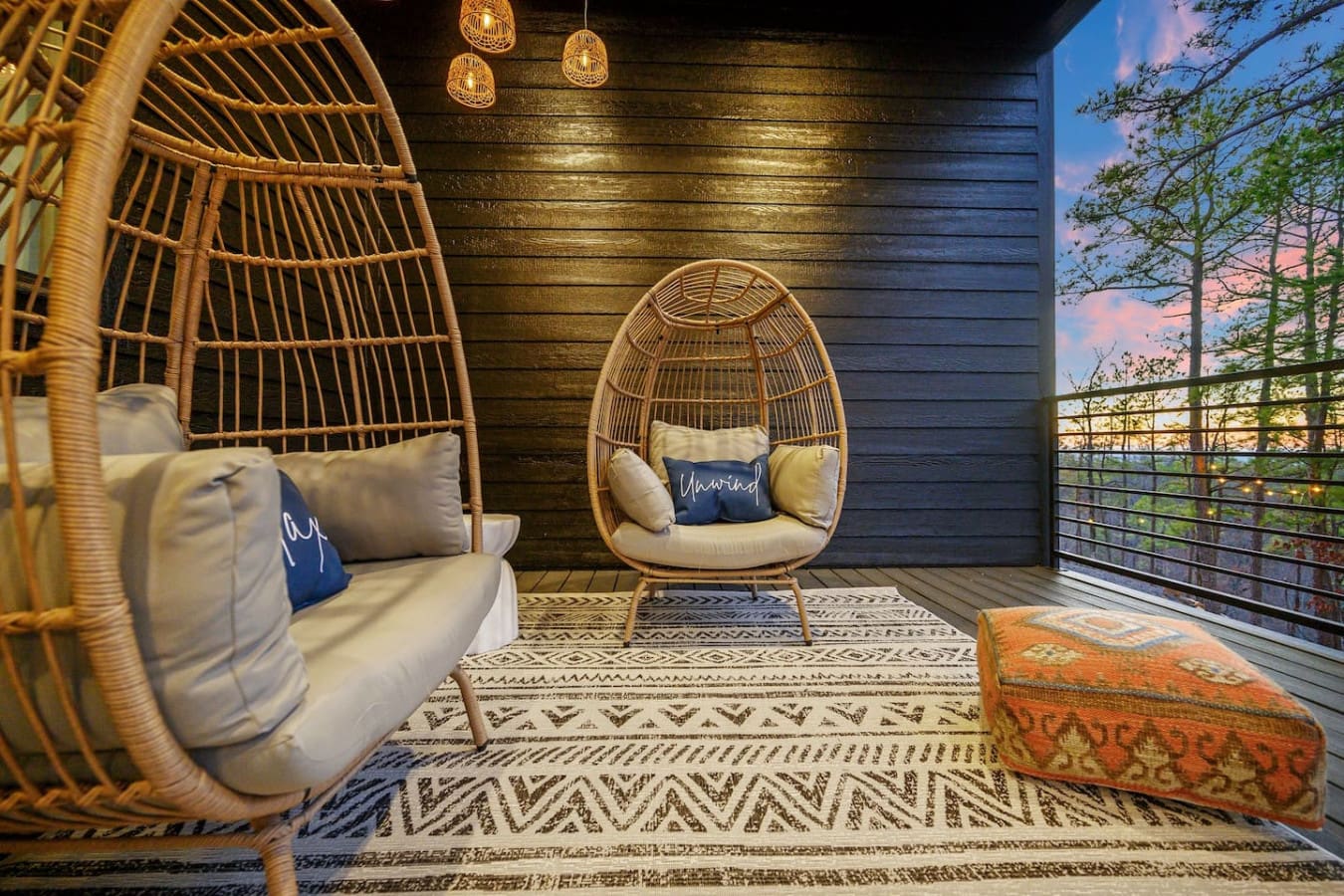 These hanging egg chairs on the covered deck are basically the ultimate spot to just zone out and watch the sunset paint the sky while you're nestled in the coziest nook imaginable.
