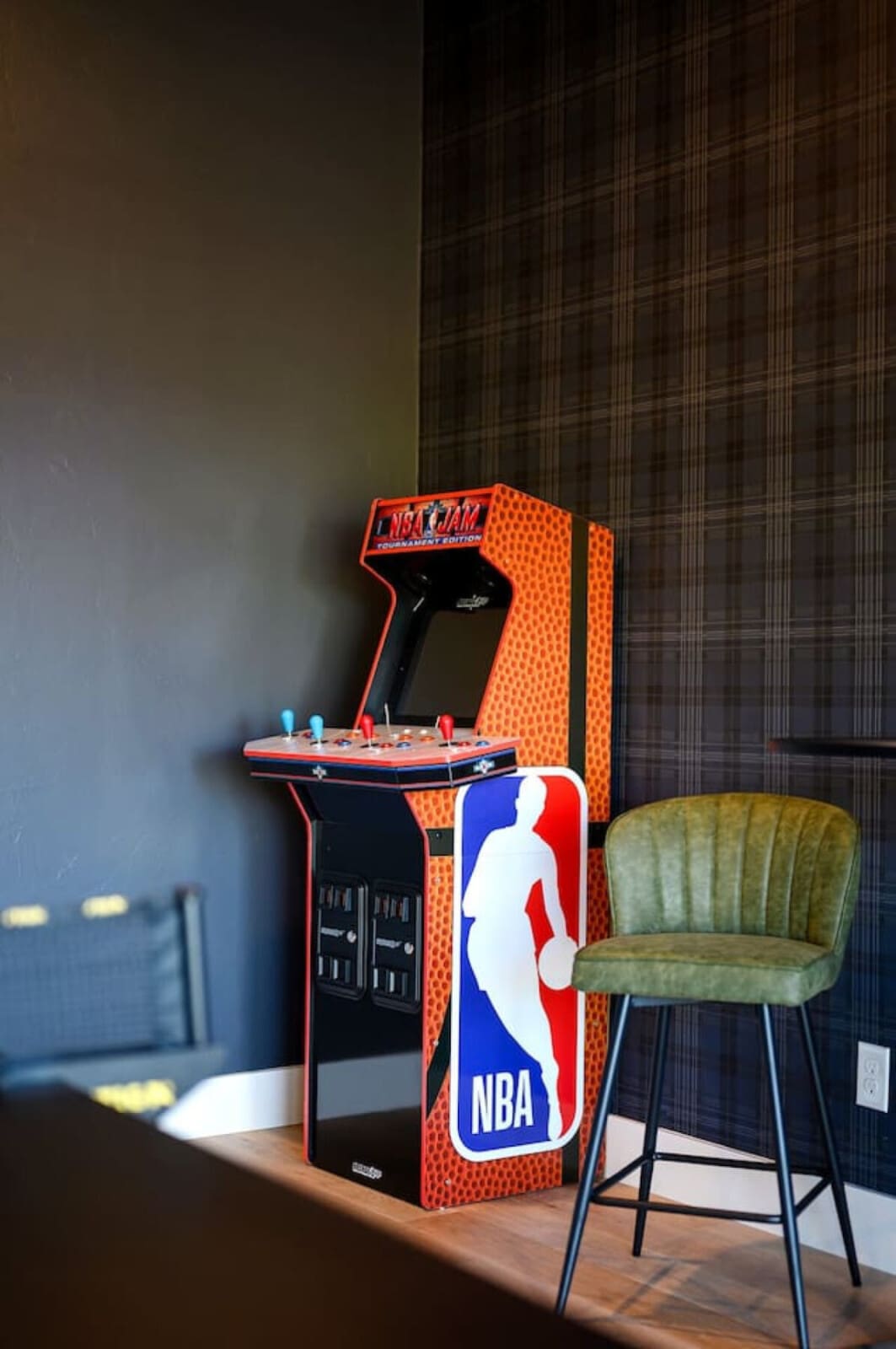 This retro arcade game with the NBA branding is basically the kind of fun detail that makes you realize this place gets it—where else can you take a break from vacation to get competitive over some classic gaming?