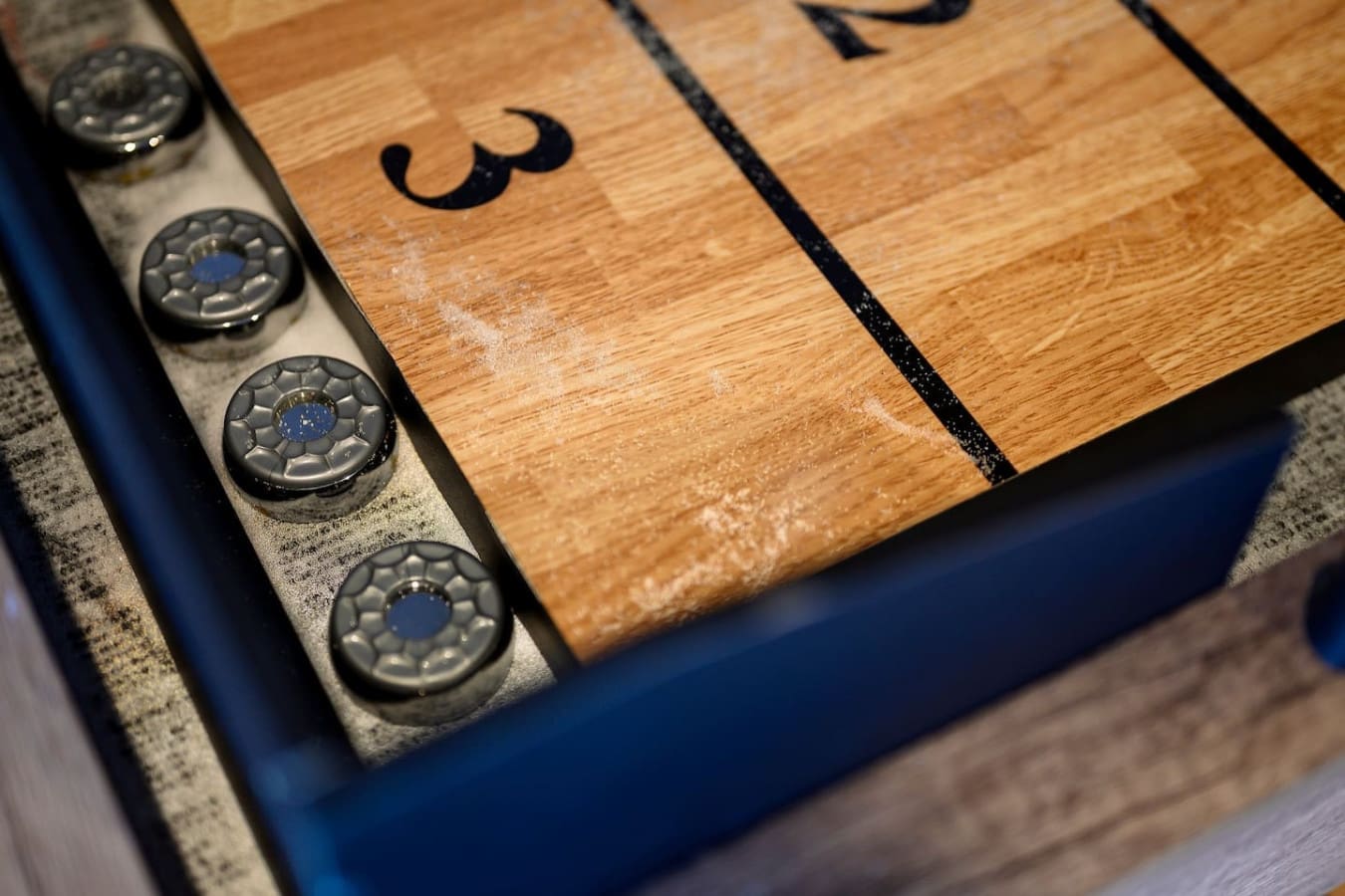 This vintage bowling lane with those classic wooden pins and detailed scoring system basically has you feeling like you've stepped back in time to the golden age of strikes and spares.