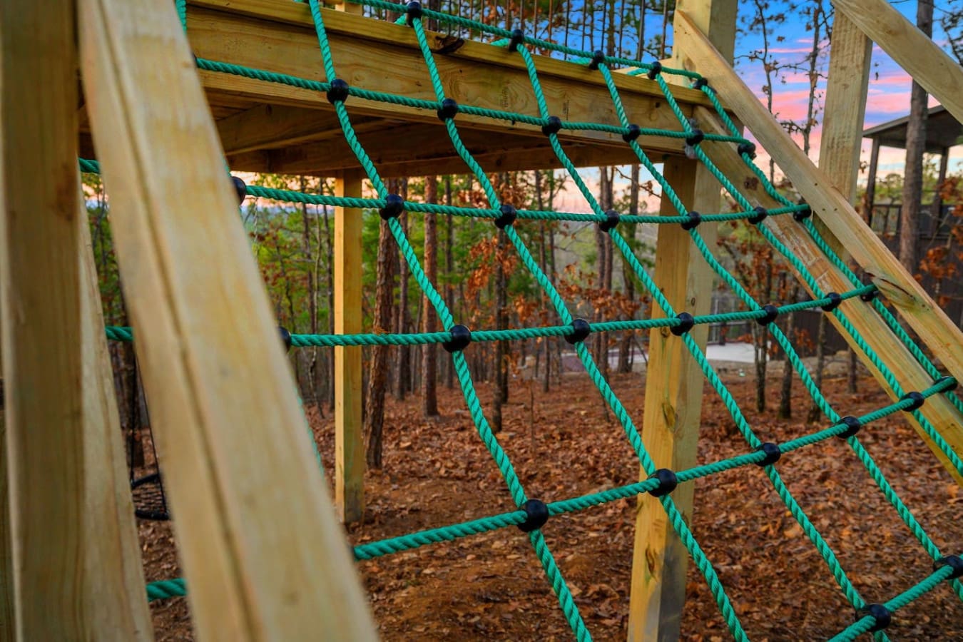 This rope climbing net strung across the deck is basically the kind of fun outdoor feature that makes you feel like a kid again, all while you're taking in those forest views and that gorgeous sky.