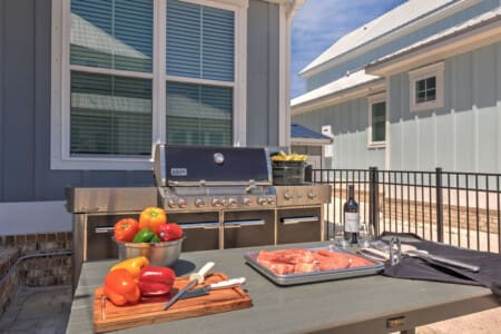 Nothing says "time to fire up the grill" quite like a rooftop deck with a pro-grade setup, ocean views, and everything you need to cook up an amazing meal with friends.