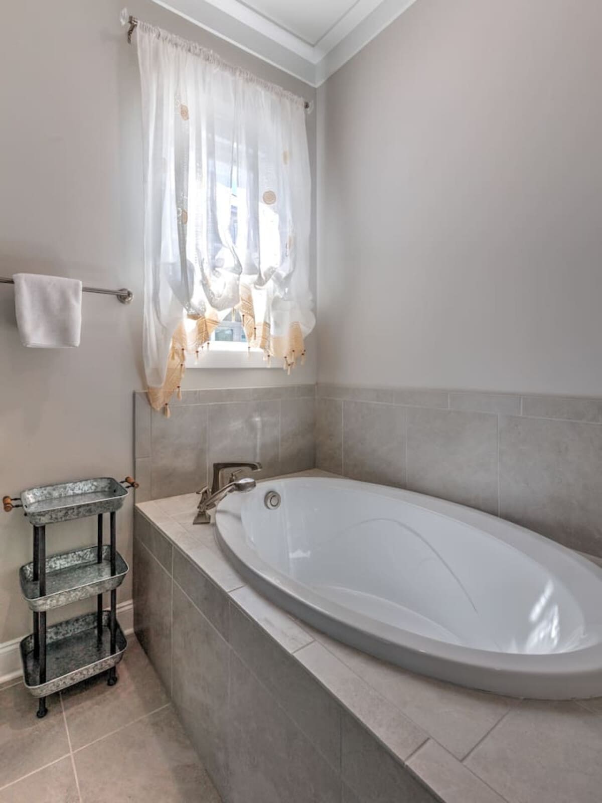 This soaking tub with its dreamy window view and that charming tie-up curtain is basically calling your name after a long day of exploring.