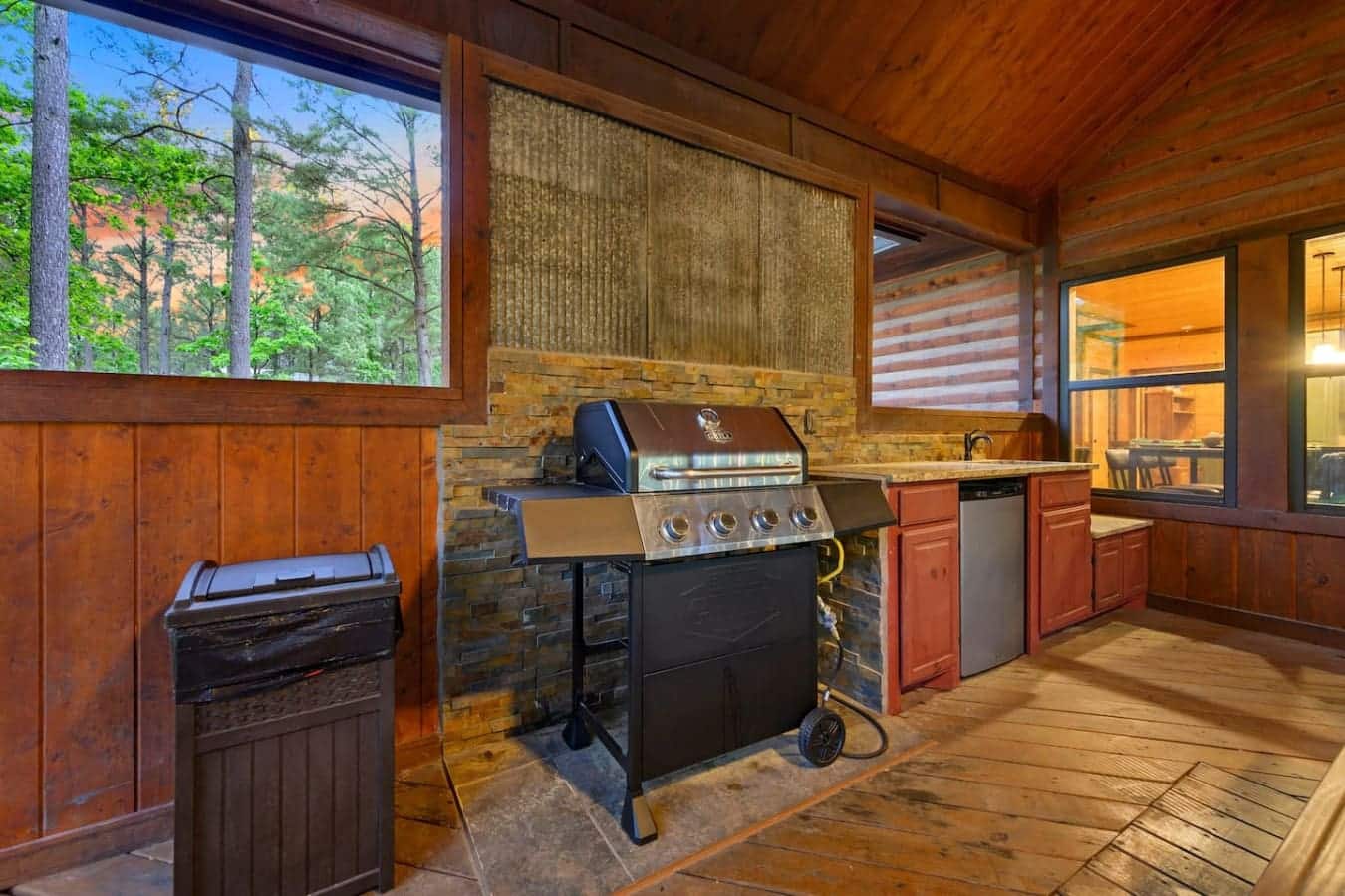 Fire up the grill whenever you feel like it, because this outdoor kitchen's got everything set up so you can actually cook a real meal without feeling like you're roughing it.
