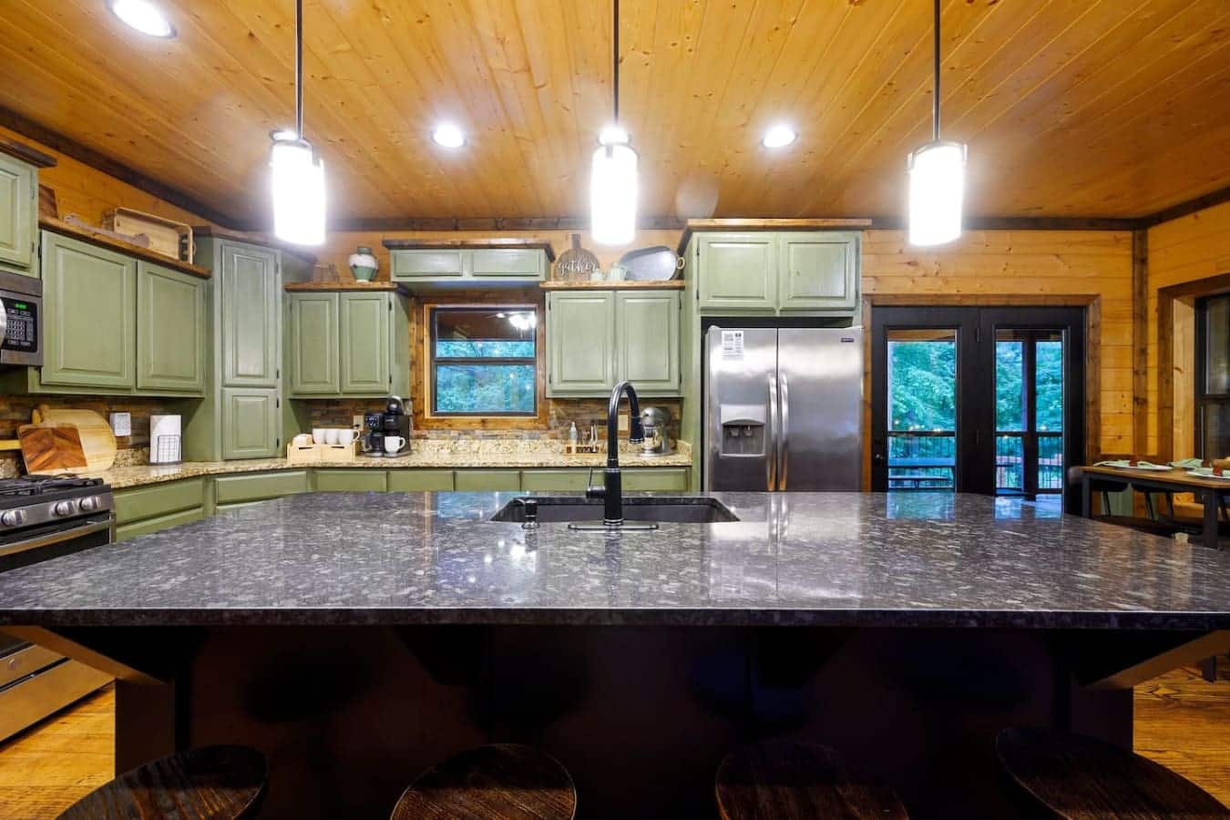 This kitchen has the kind of counter space and island setup where you can actually cook a real meal instead of just reheating stuff while everyone else hangs out in the living room.