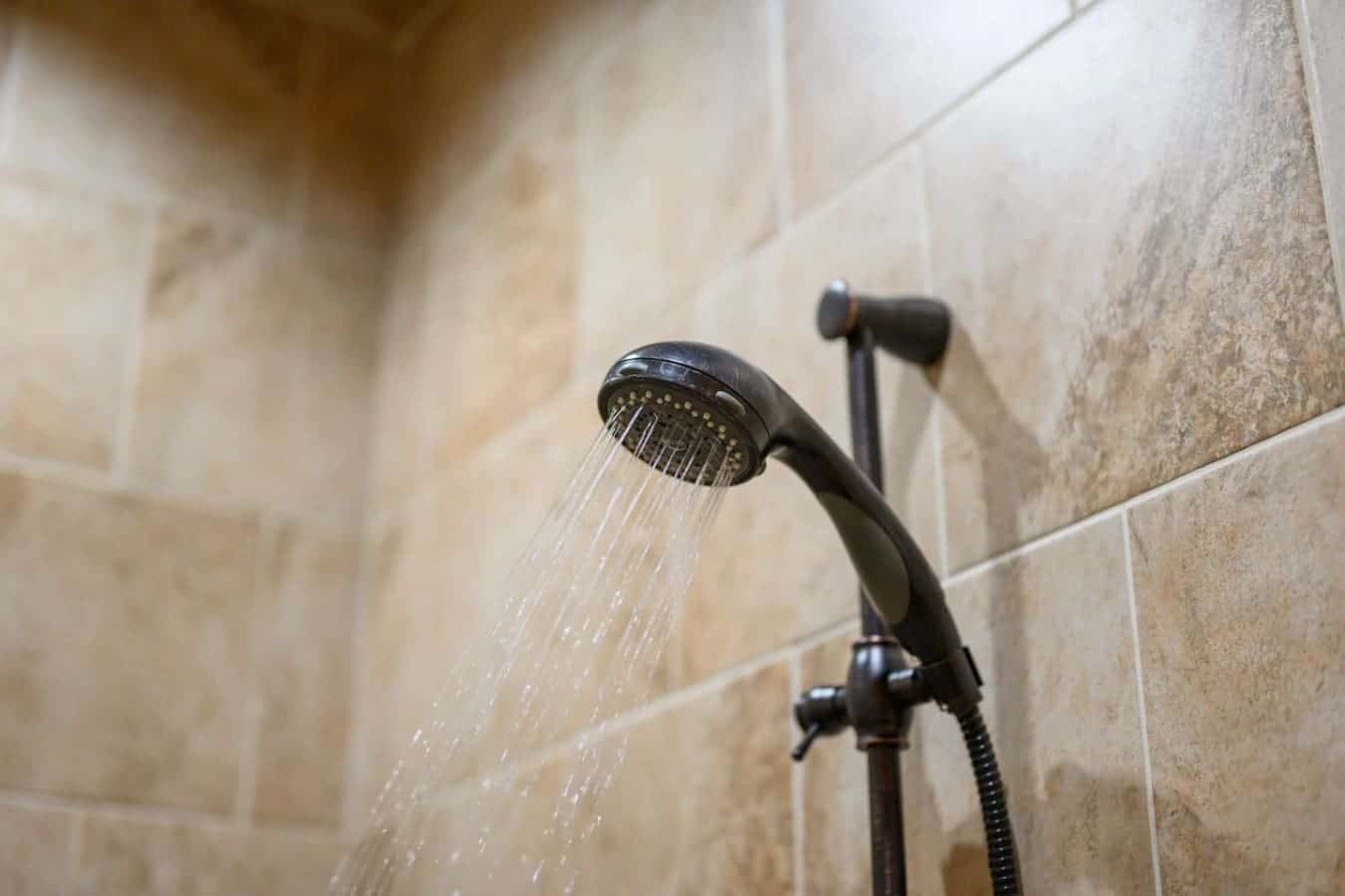 The showerhead here actually has enough flow to make you feel human again after a long day of doing absolutely nothing.