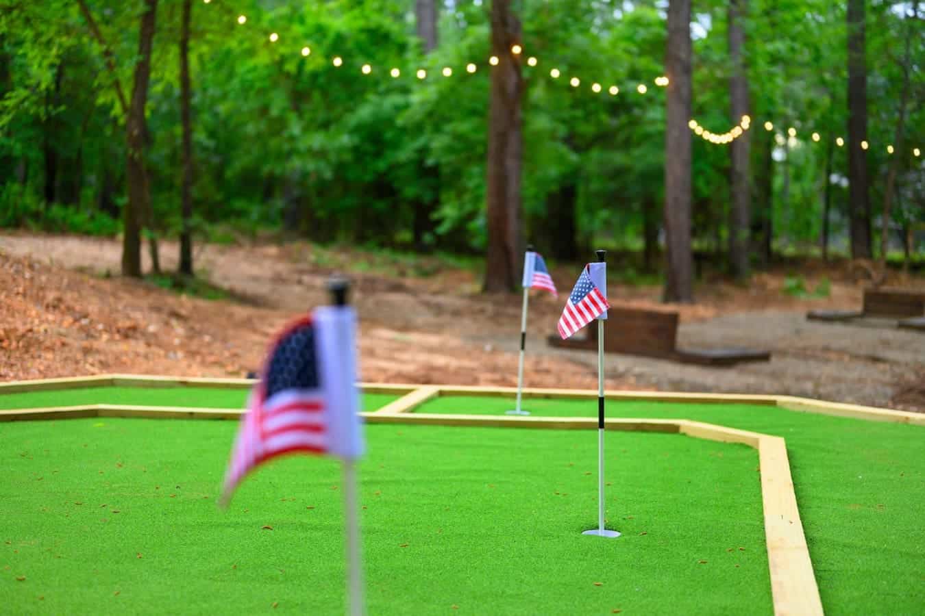 Grab your crew and see if you can sink a putt on this mini golf course hidden in the trees—bonus points if you actually make it before the sun sets and those string lights take over.